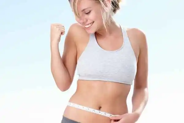 woman happy after fat reduction treatment Basildon