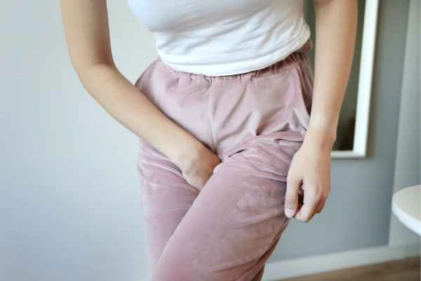older woman running to the toilet because of urinary incontinence Basildon
